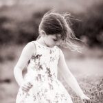 black and white little girl in a lavender field